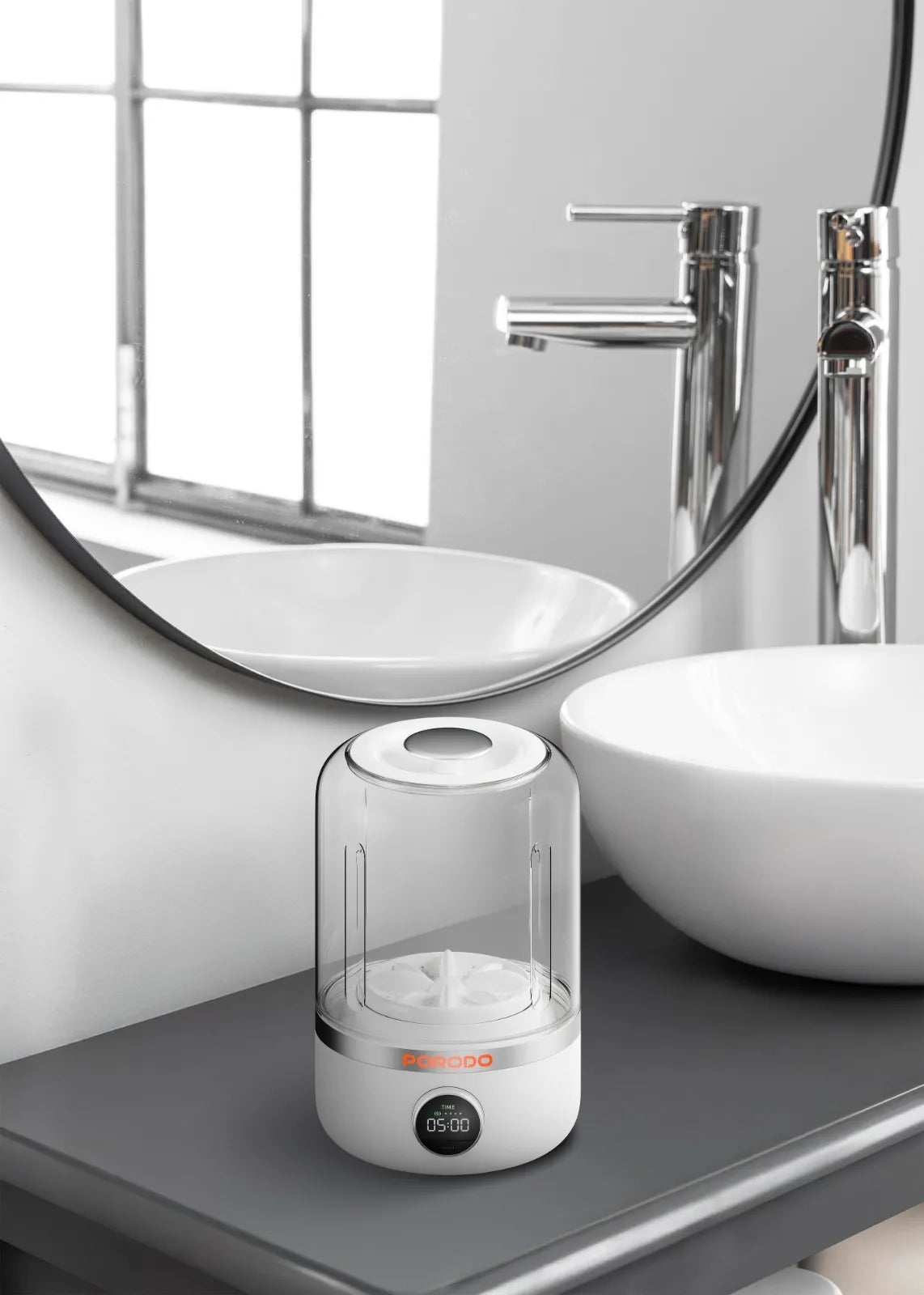 Porodo Mini Laundry Cup 1.2L washing machine with 4000mAh battery and 10W power, showcasing compact design and functionality.