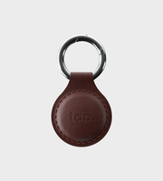 Handmade brown leather Tap NFC keychain with a sleek design, designed for easy contactless sharing and everyday use.