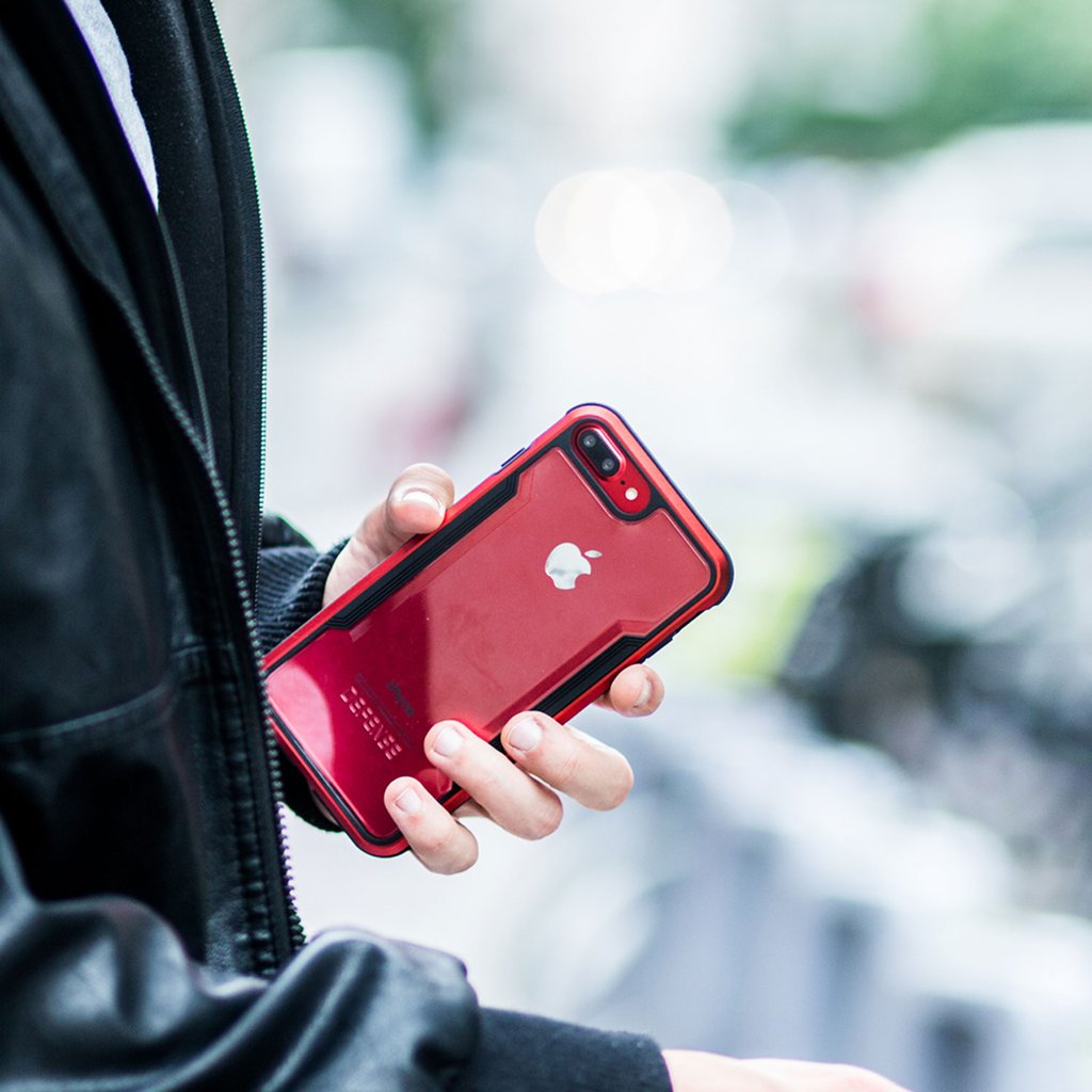 Red X-Doria Defense Shield anti-shock case for iPhone 8 Plus and 7 Plus, showcasing durable protection and sleek design.