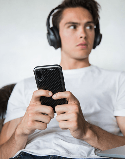 Aukey B25 with XDoria Defense Lux case, showcasing carbon design and shockproof protection up to 3 meters.