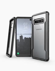 Black XDoria Defense Shield case for Samsung Galaxy S10 Plus, drop-tested with 3M protection by Smartkoshk, showing reinforced edges.