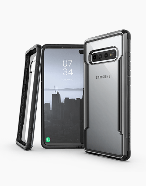 Black XDoria Defense Shield case for Samsung Galaxy S10 Plus, drop-tested with 3M protection by Smartkoshk, showing reinforced edges.