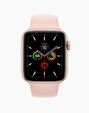 Apple Watch Series 5 GPS 44mm gold aluminum case with pink band, smartwatch display showing time and app icons.