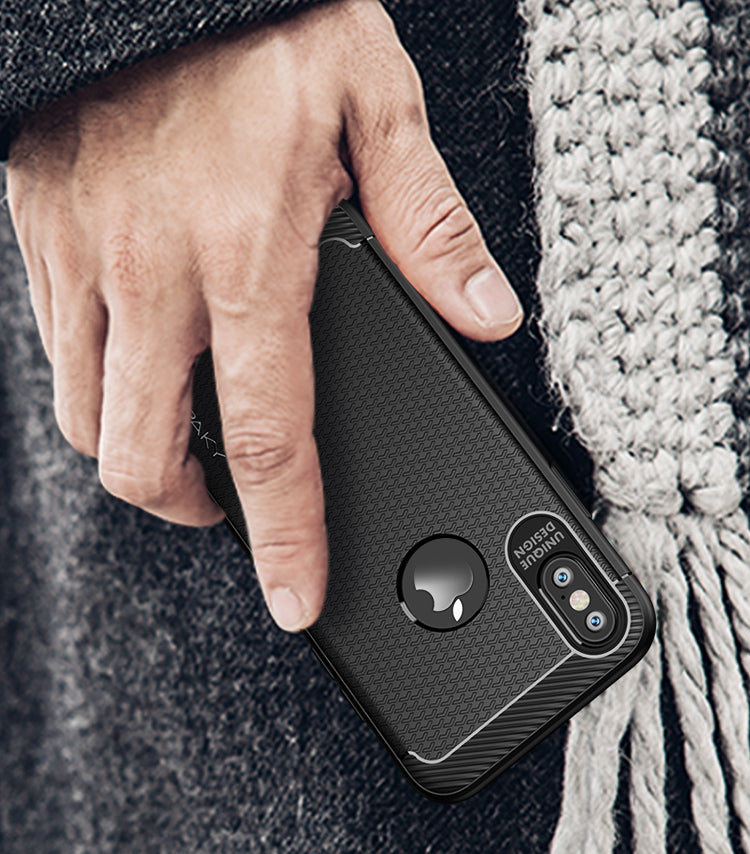 Brown iPaky slim anti-shock case for iPhone X, showcasing a sleek design with textured finish and precise cutouts.